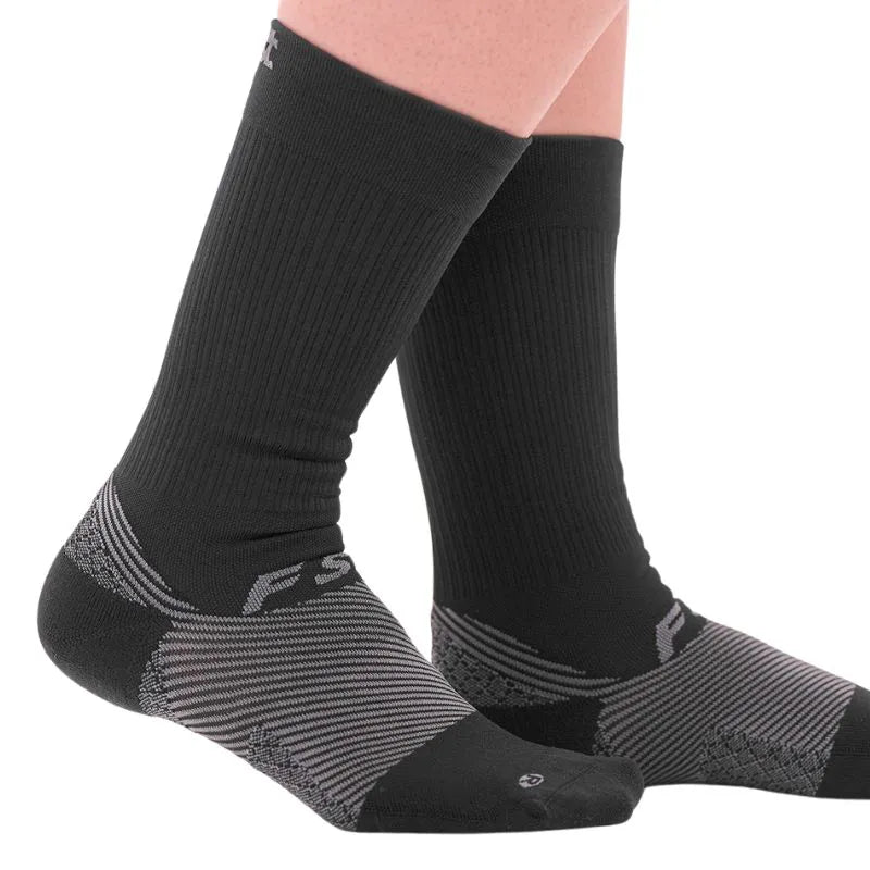 OrthoSleeve black crew length plantar fasciitis socks on feet