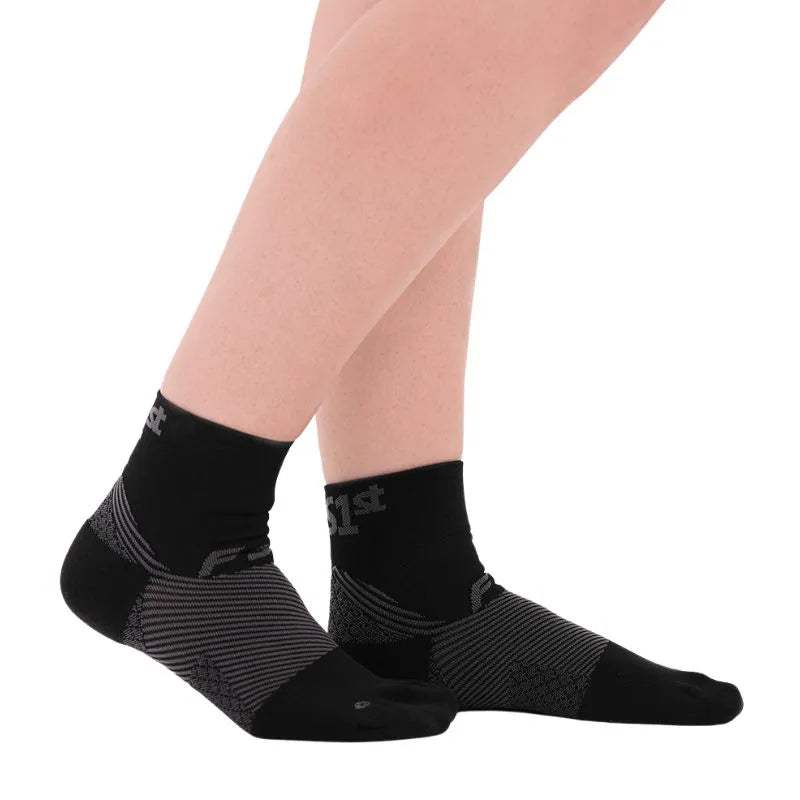 OrthoSleeve black quarter crew length plantar fasciitis socks on feet