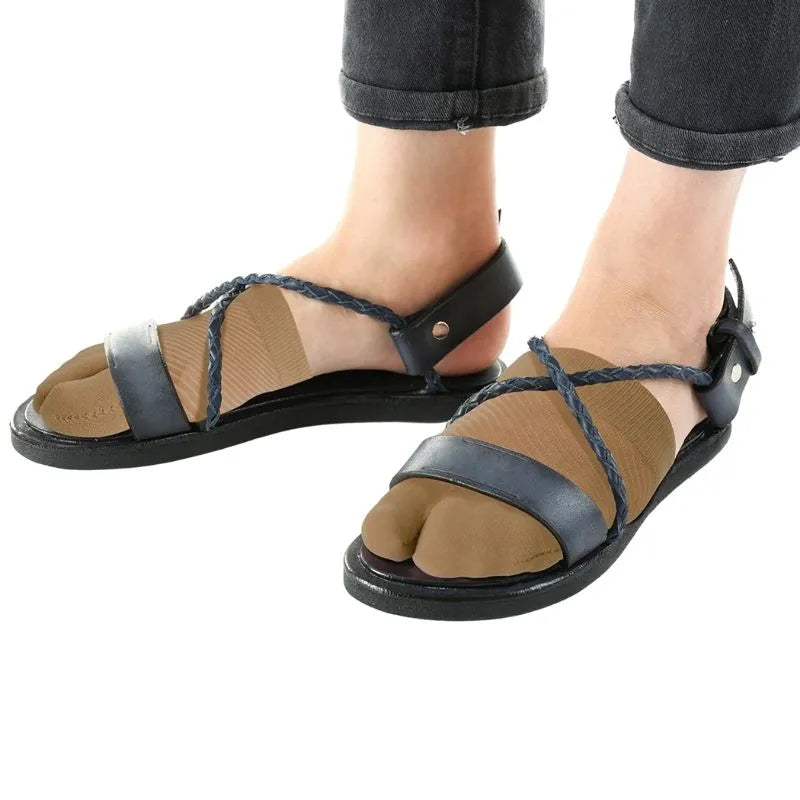 Lifestyle image of a person wearing the OrthoSleeve Forefoot Compression Sleeves with sandals