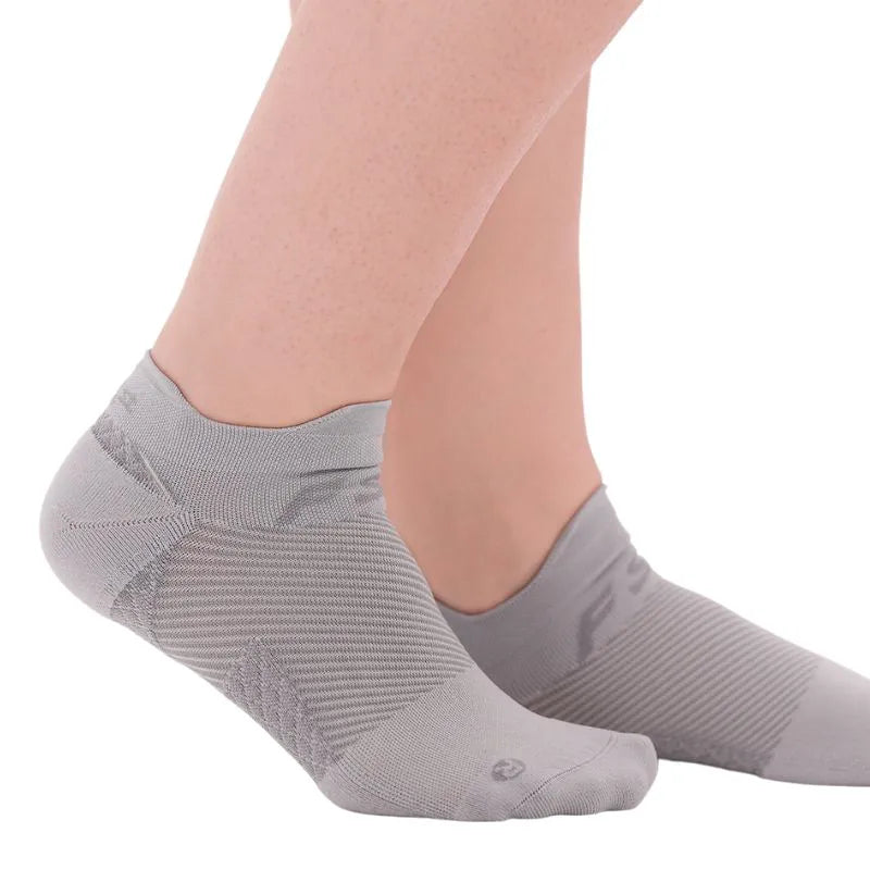 OrthoSleeve grey no show plantar fasciitis socks on feet