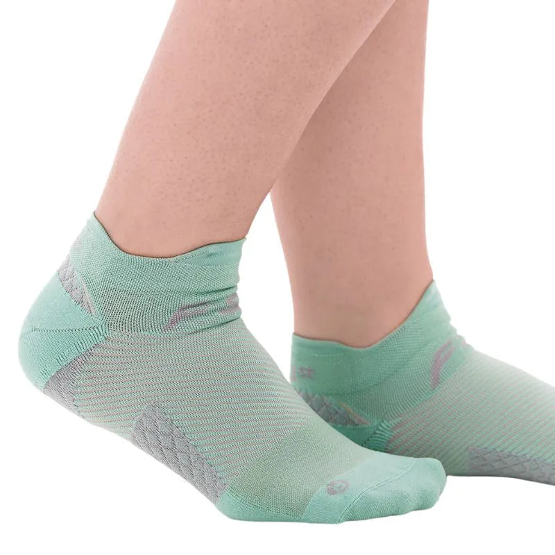 OrthoSleeve mint no show plantar fasciitis socks on feet