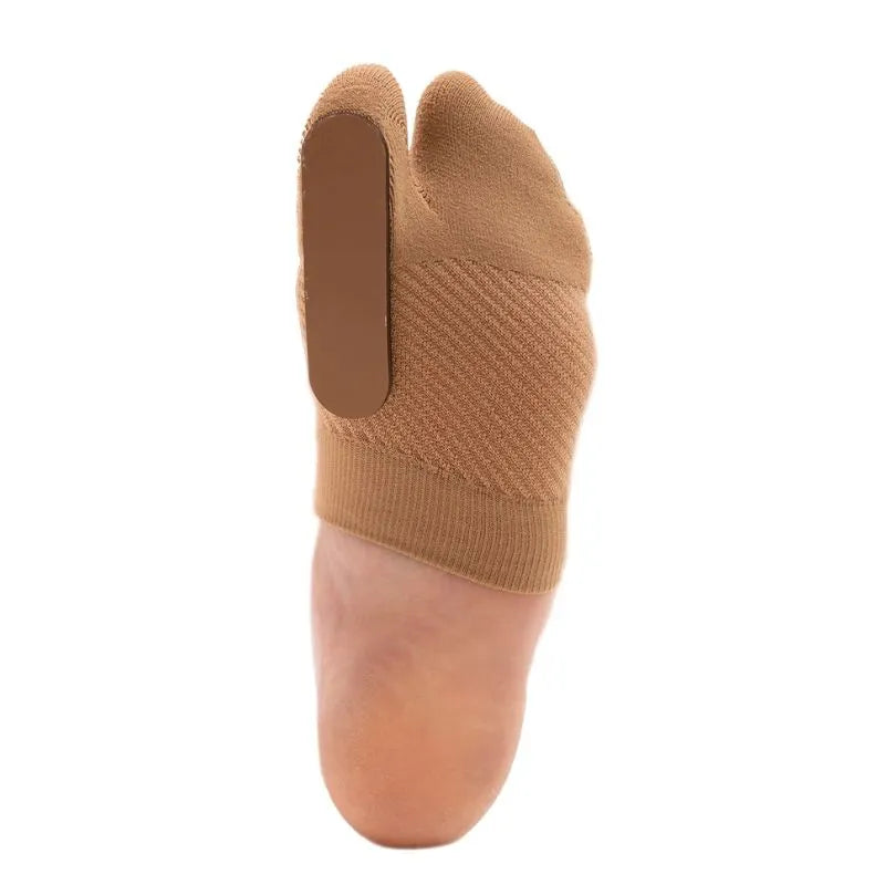 Image of the bottom of a person's foot while wearing the OrthoSleeve Turf Toe Brace