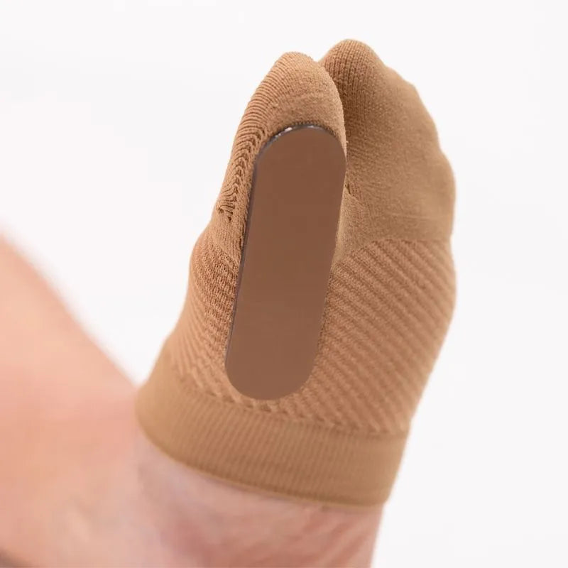 Up-close image of the OrthoSleeve Turf Toe Brace on a person's foot