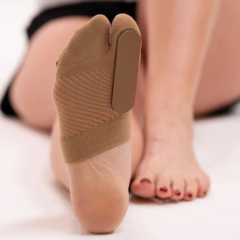 Lifestyle image of a woman wearing the OrthoSleeve Turf Toe Brace showing the bottom splint