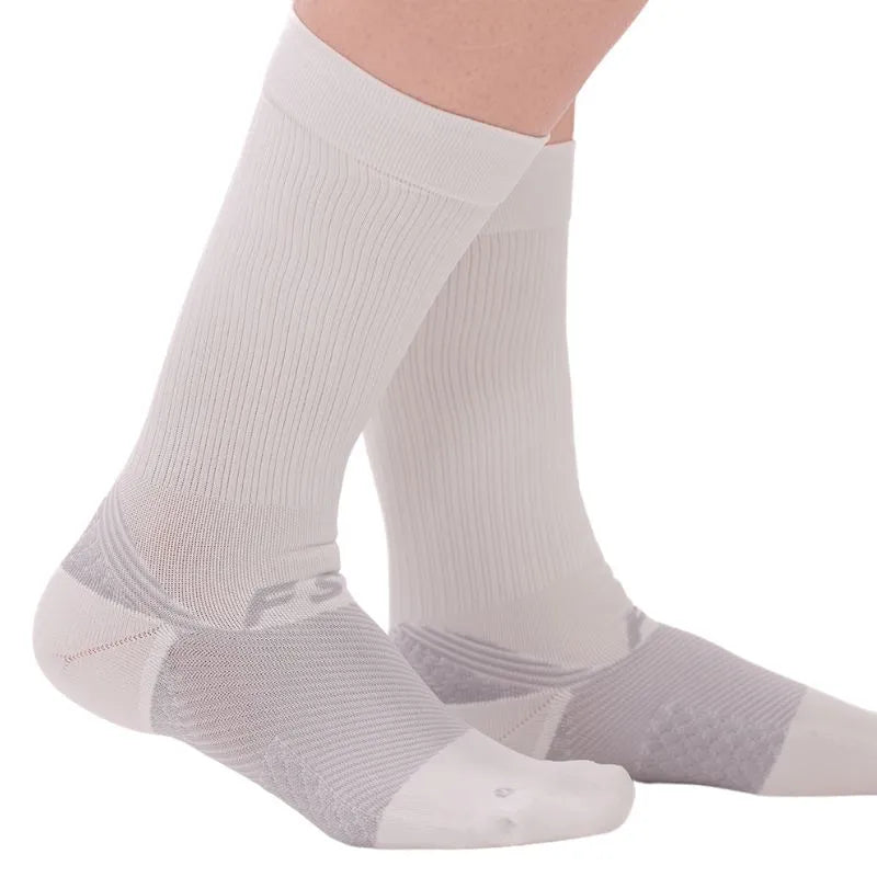 OrthoSleeve white crew length plantar fasciitis socks on feet