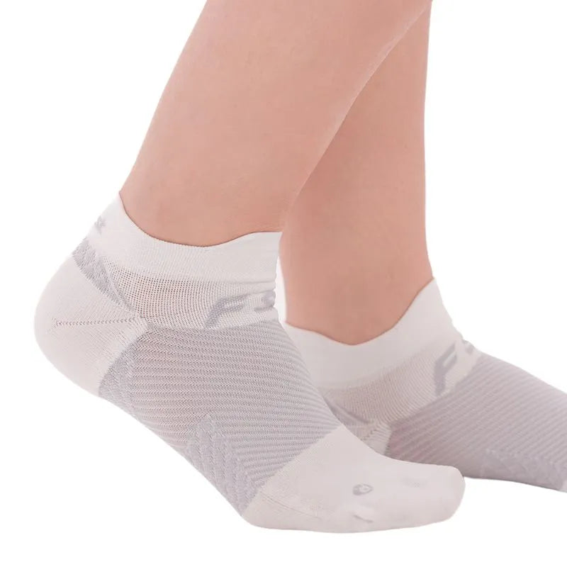 OrthoSleeve white no show plantar fasciitis socks on feet